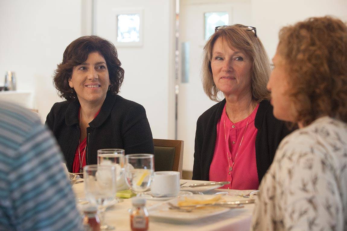 Participants meet with Gina Mastro