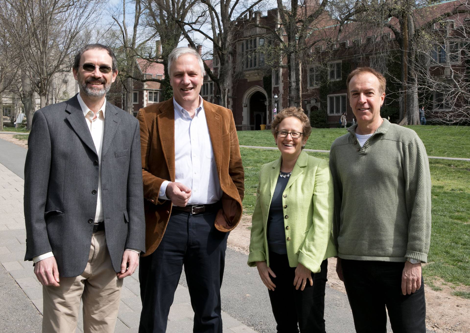 Marc Fleurbaey, Stephen Pacala, Melissa Lane, Rob Nixon standing outside