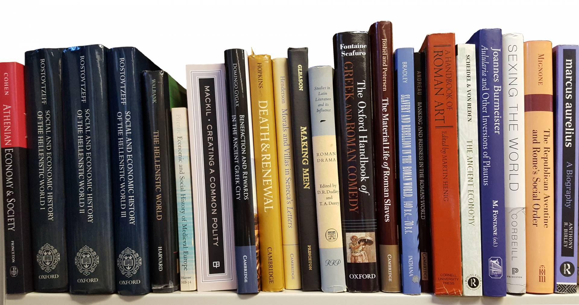 books on shelf in Dan-el Padilla Peralta's office