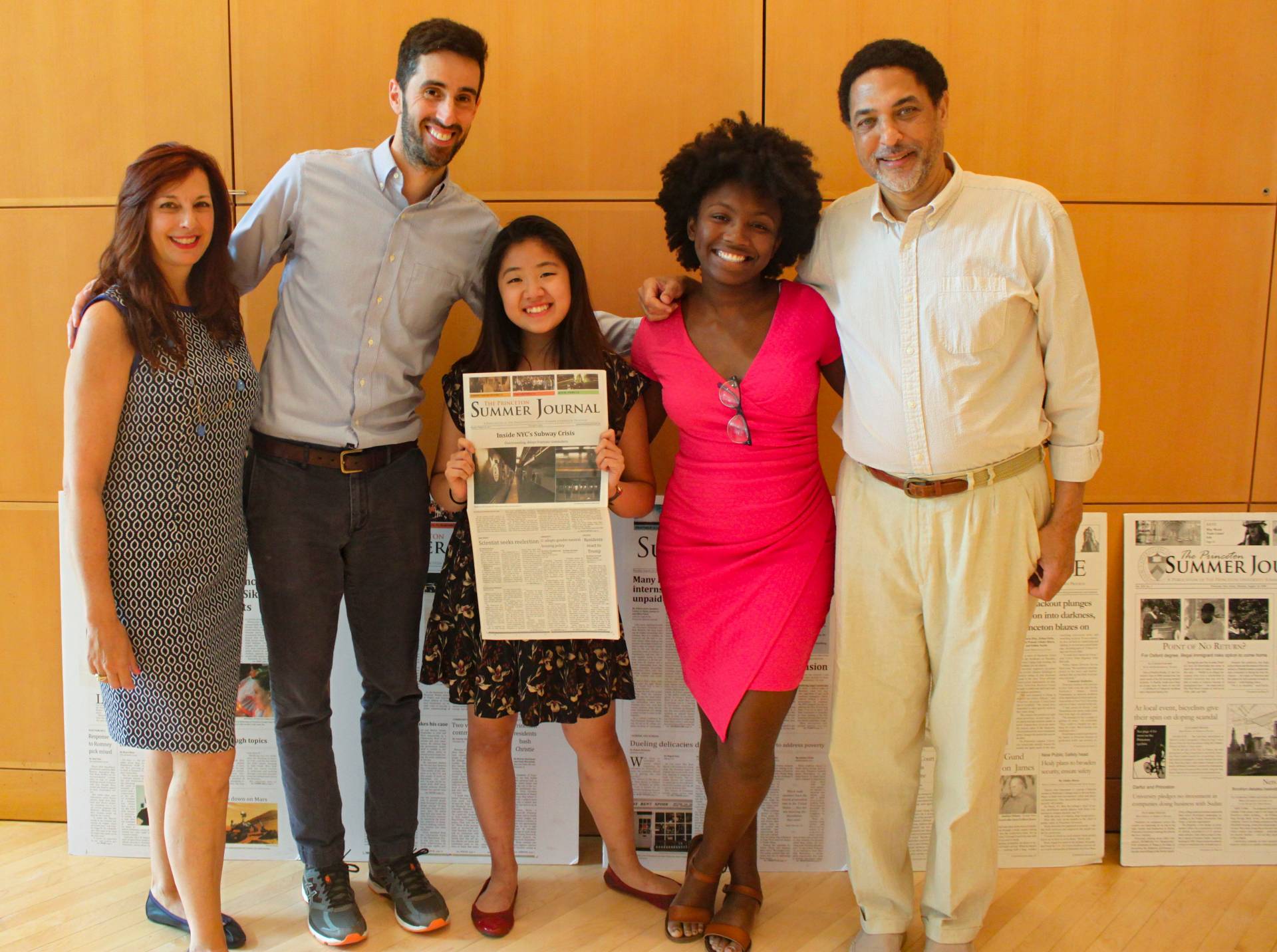 Vayne Ong holds Princeton Summer Journal newspaper along with Jeri Schaefer, Richard Just , Kat Powell, Jim Floyd