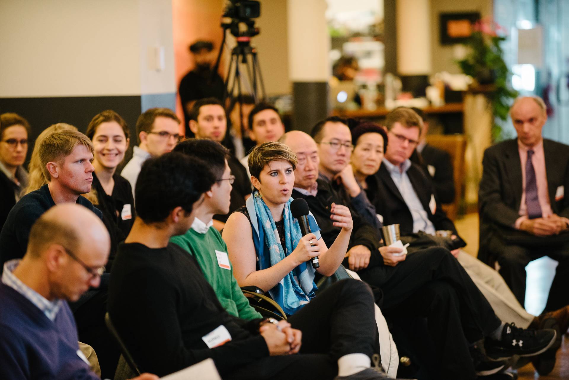 Audience member asks a question at TigerTalks in the city