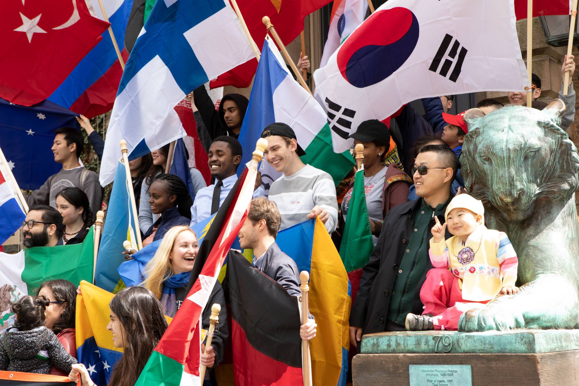 International Parade of Flags standing on Nassau Hall front steps