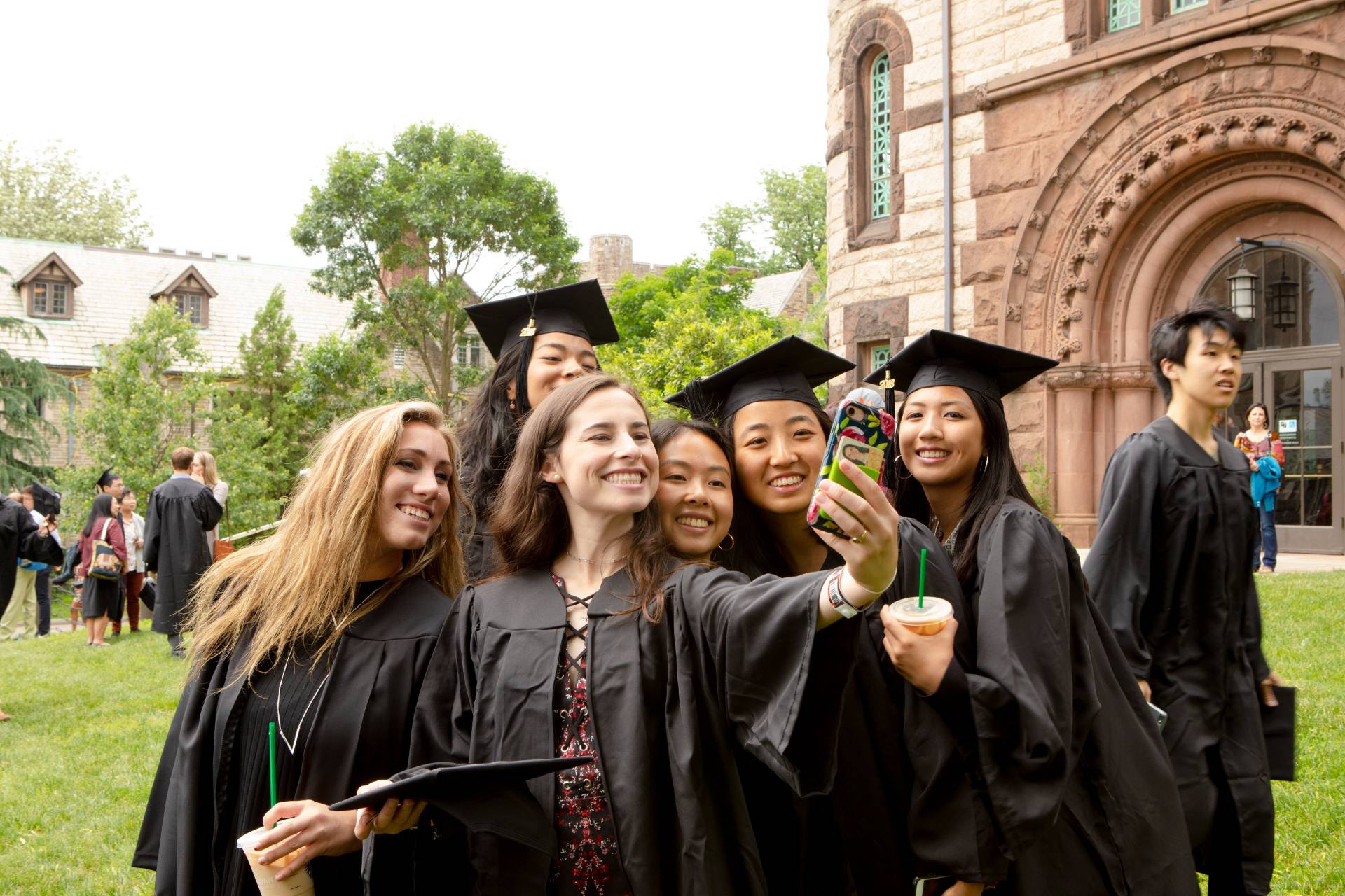 Students take a group selfie before the Baccalaureate ceremony