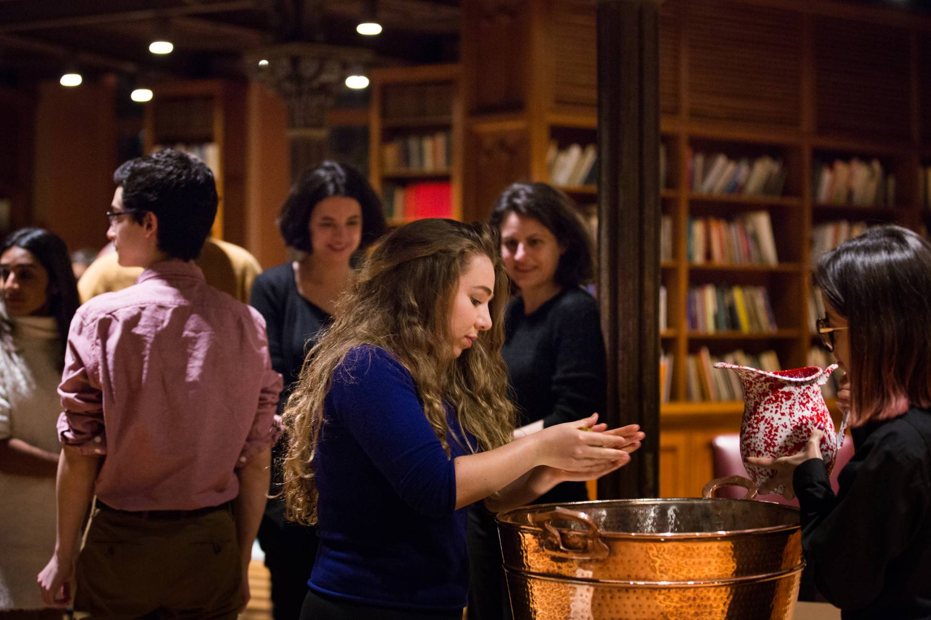 Diners wash hands before eating the meal