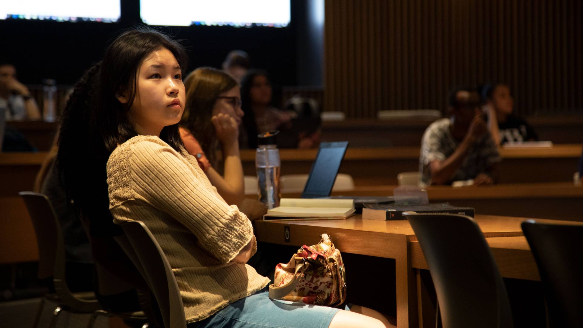 Helen So and students listen to FSI presentation