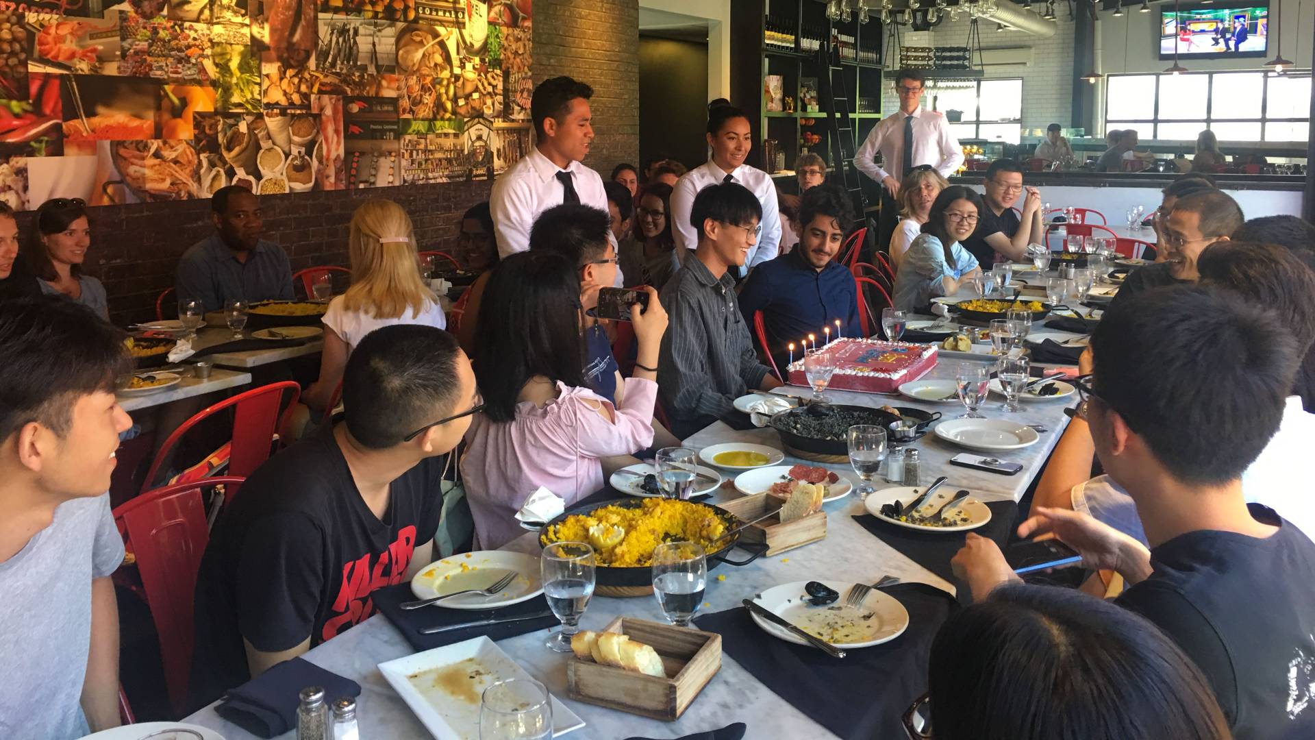 International students celebrating birthday at lunch