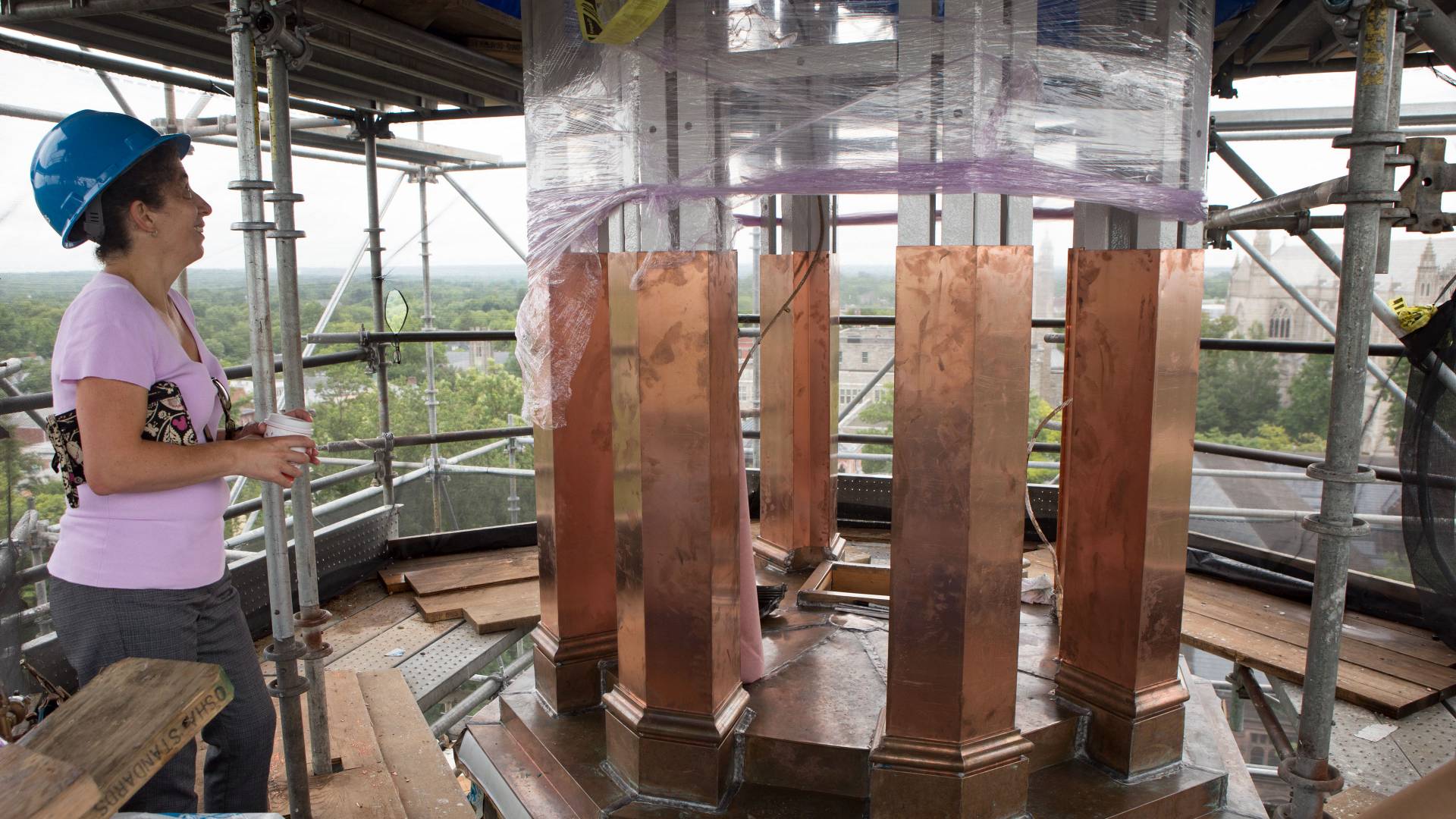 Alexis Mustchler looking at restoration work on Nassau Hall cupola