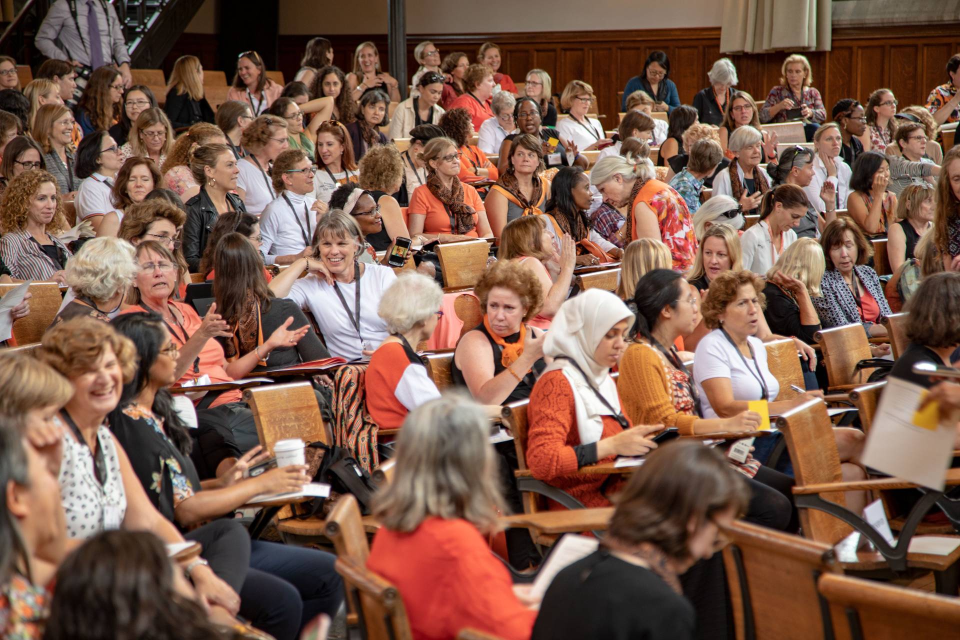 Audience  talking before Jill Dolan presentation