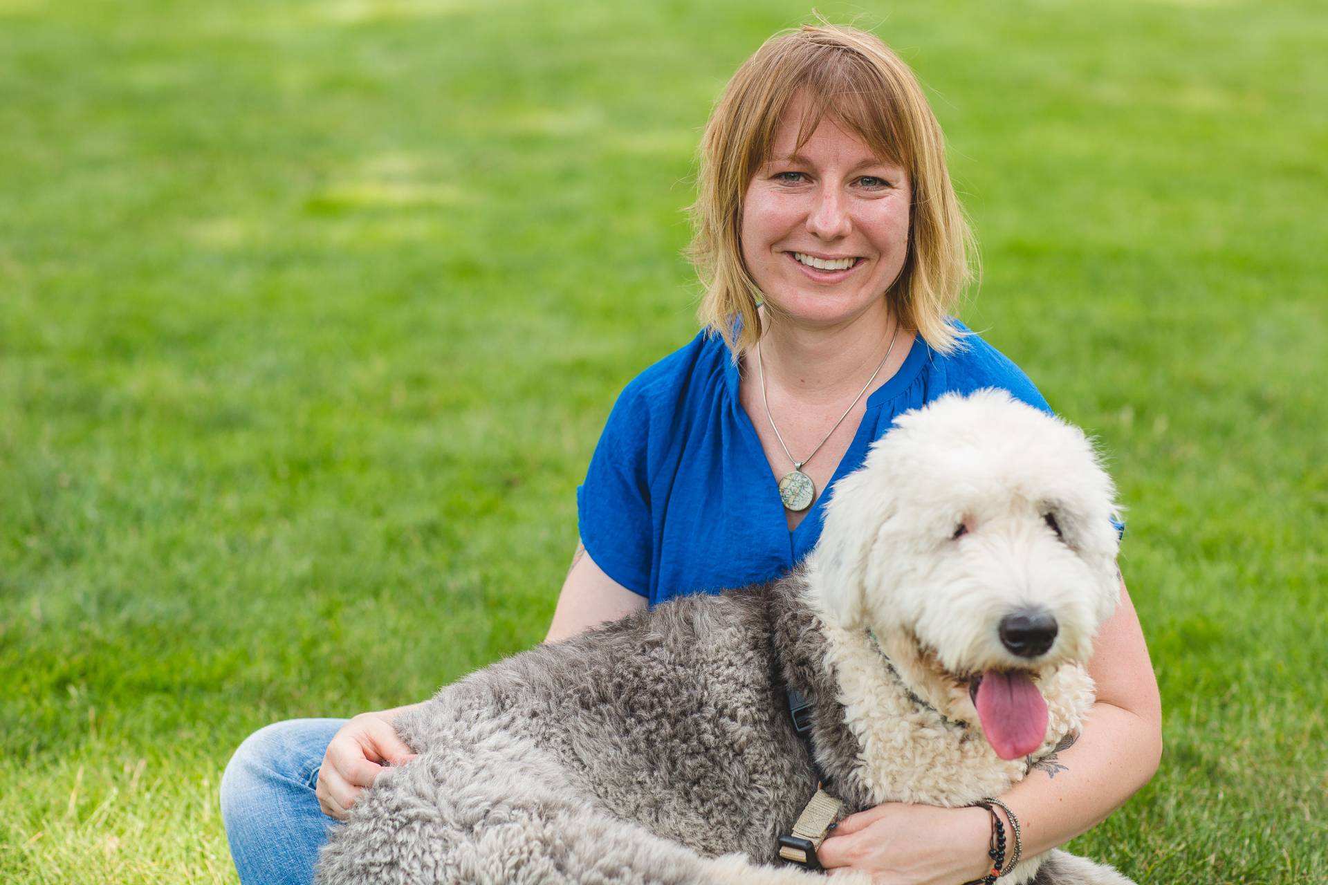 Bridgett vonHoldt sitting with dog