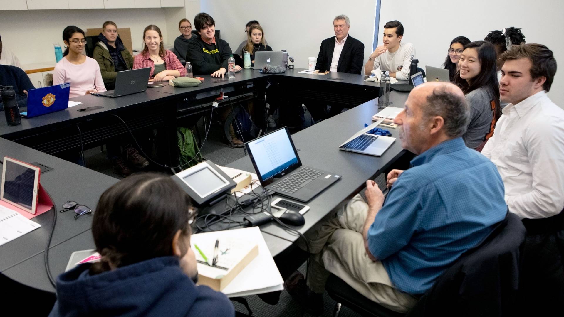 Professor Littman speaking to a class of students and observers