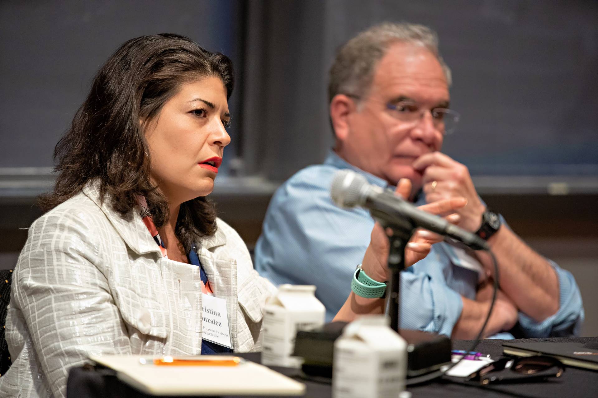 Khristina Gonzales and Miguel Centeno speak on a panel