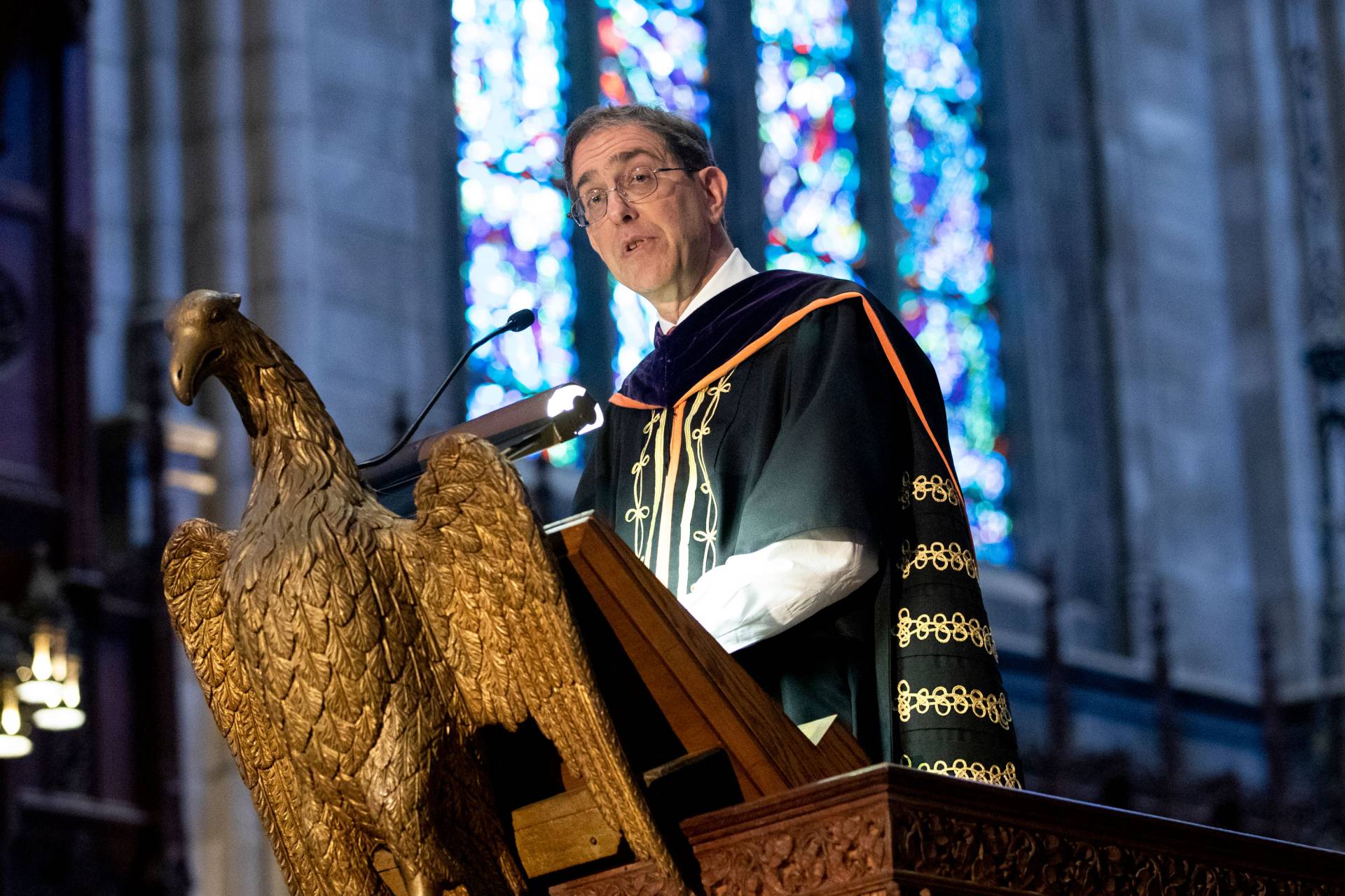 President Eisgruber speaking at podium