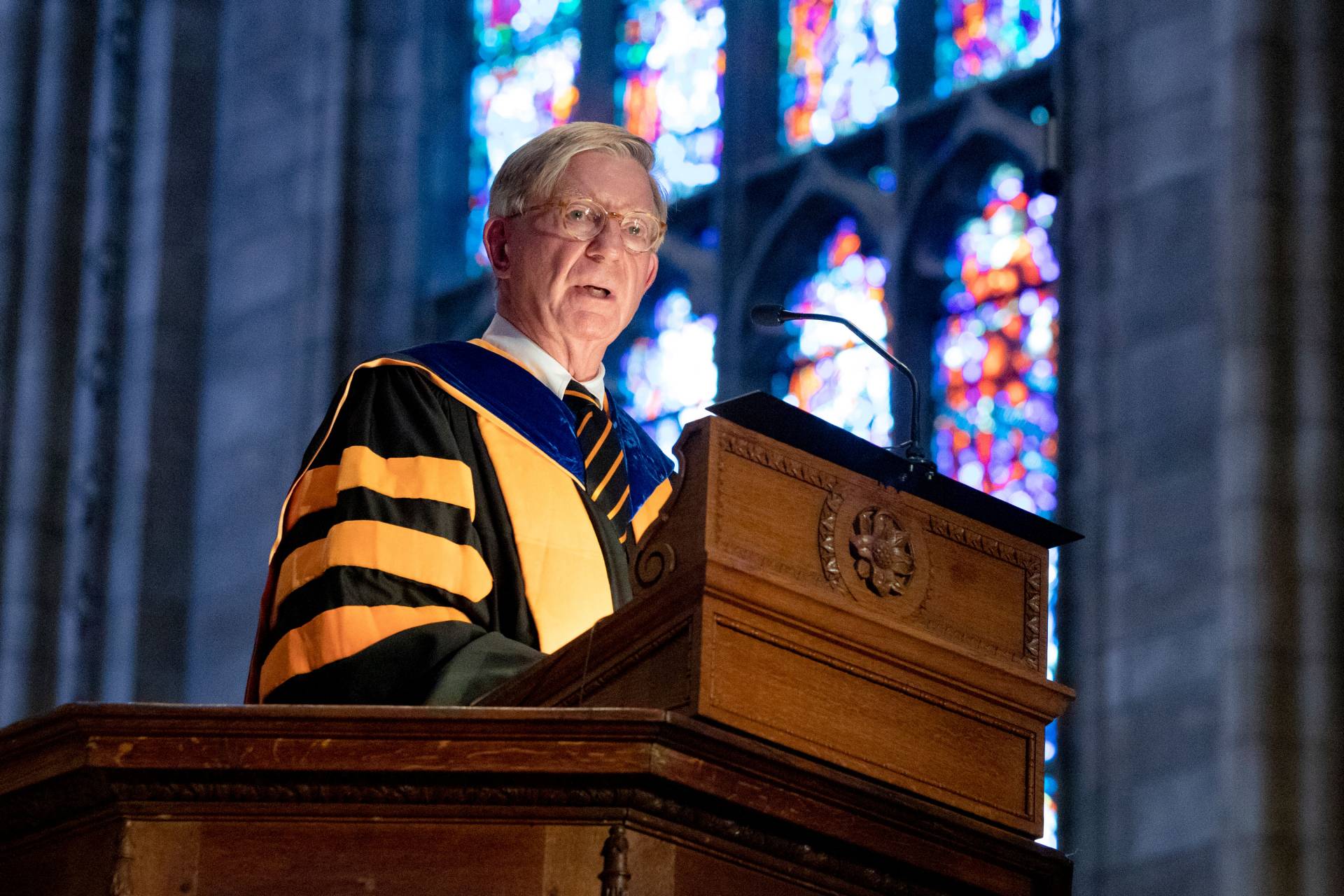 George Will speaking at podium