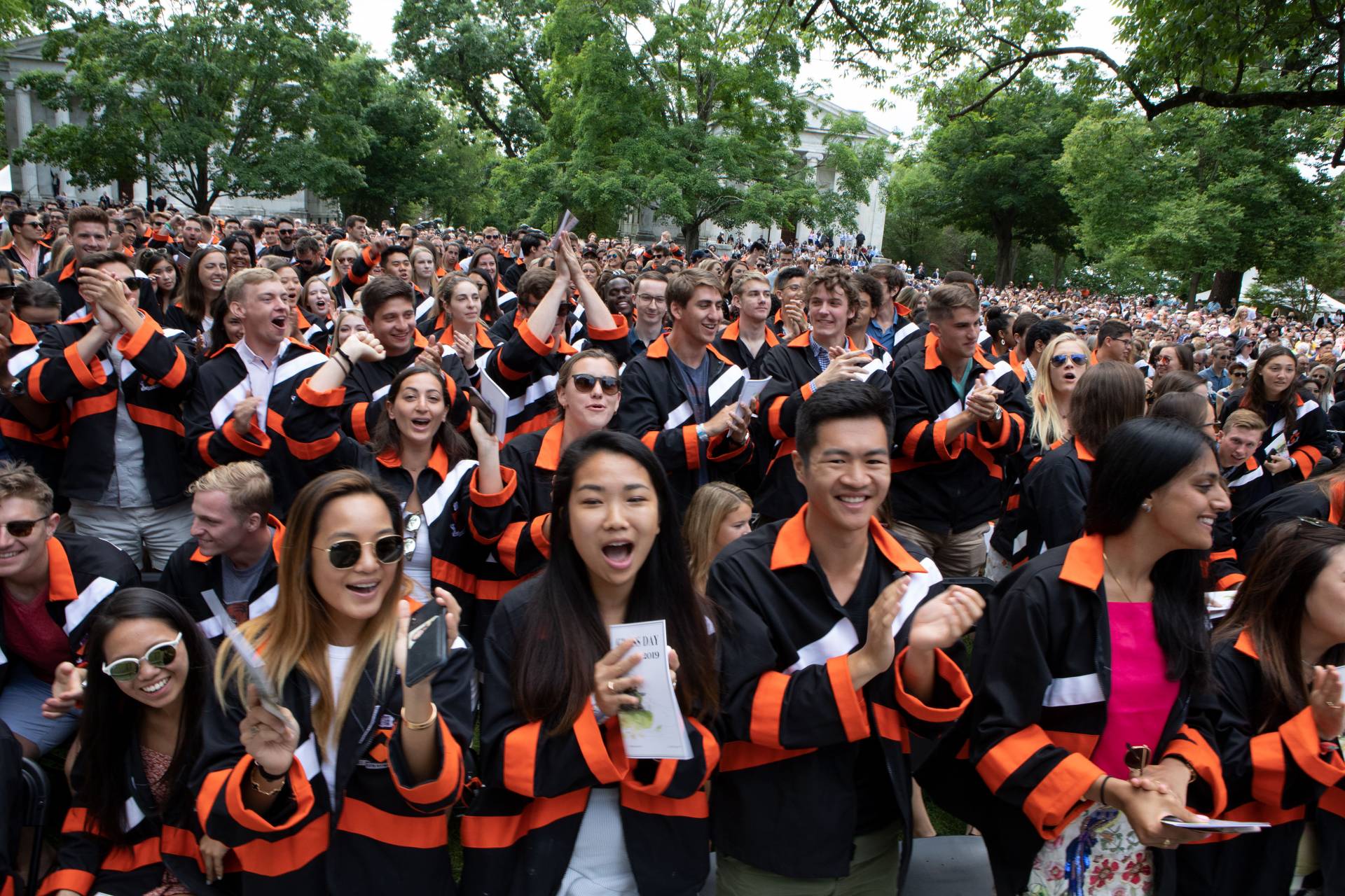 A crowd of seniors cheer