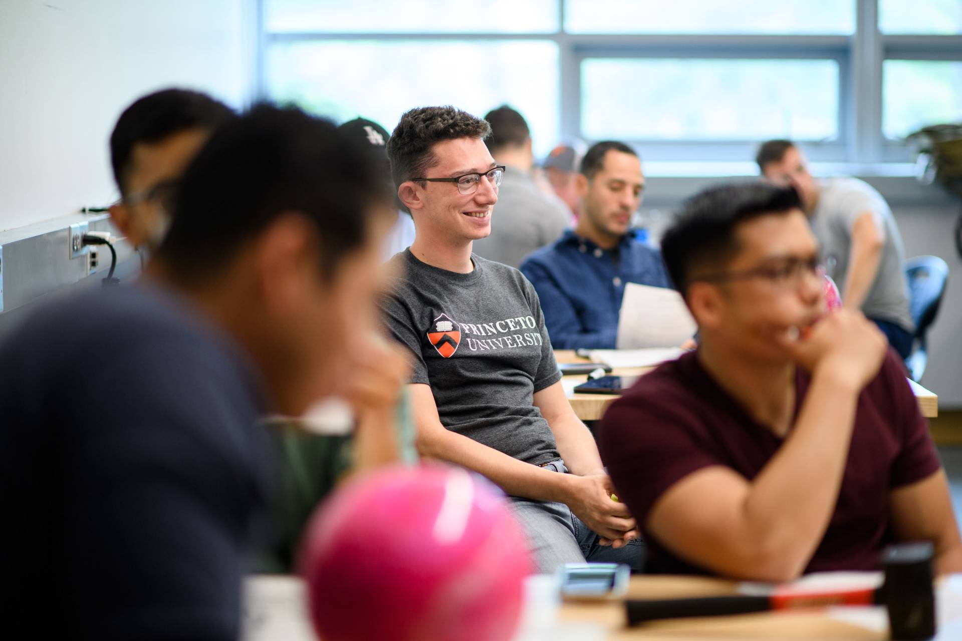 David Piegaro sitting amongst classmates