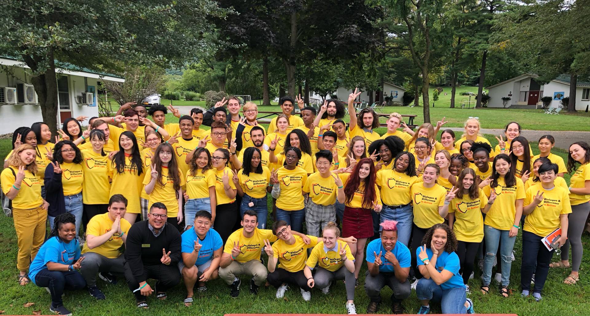 Group of students wearing yellow T-shirts