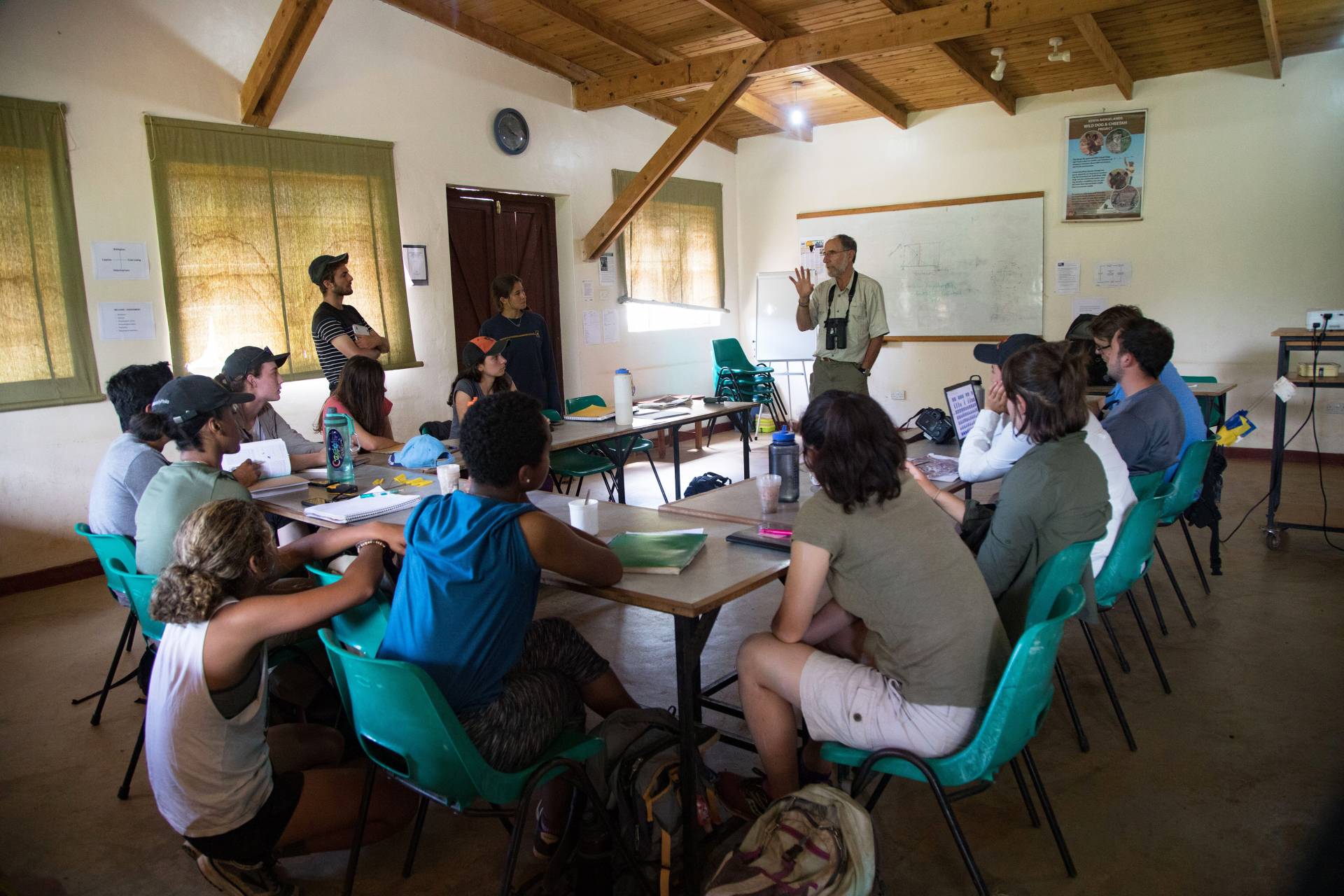 Daniel Rubenstein speaking in front of students in a class at the center