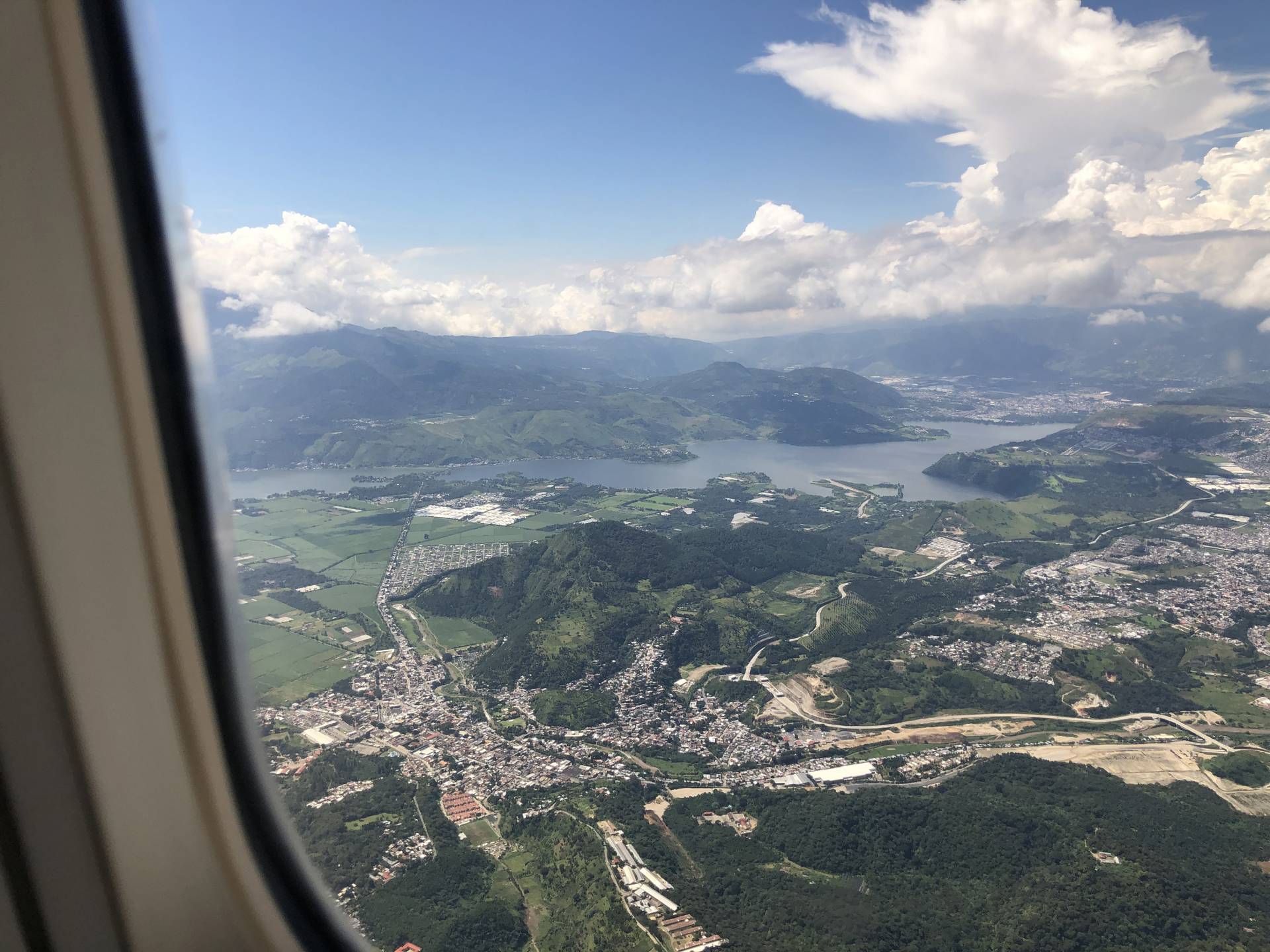 View out of the plane window, looking down on the Antigua Valley