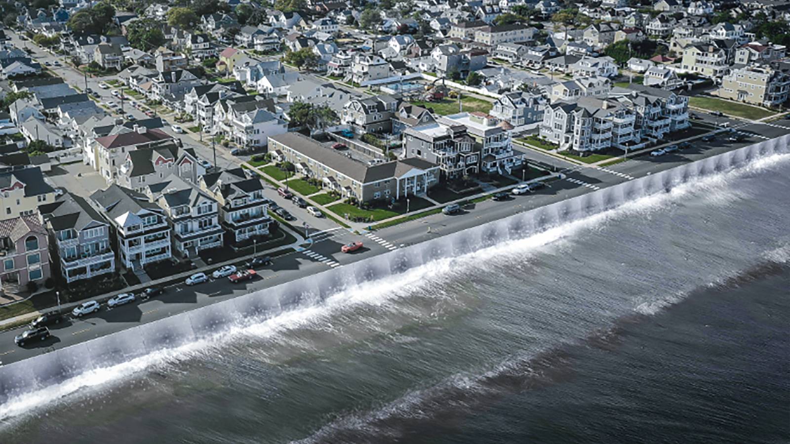Waves come up towards buildings near a beach