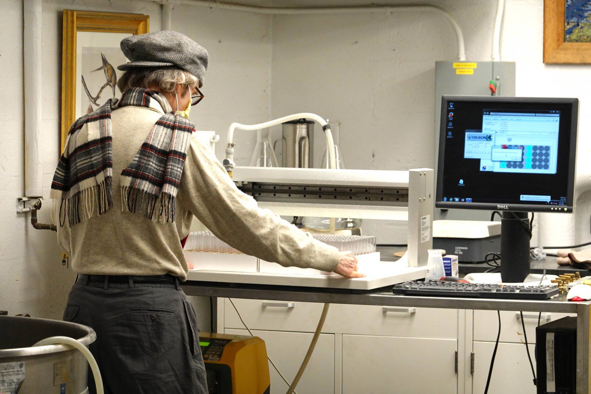 Gordon Gray dispenses the food into tubes