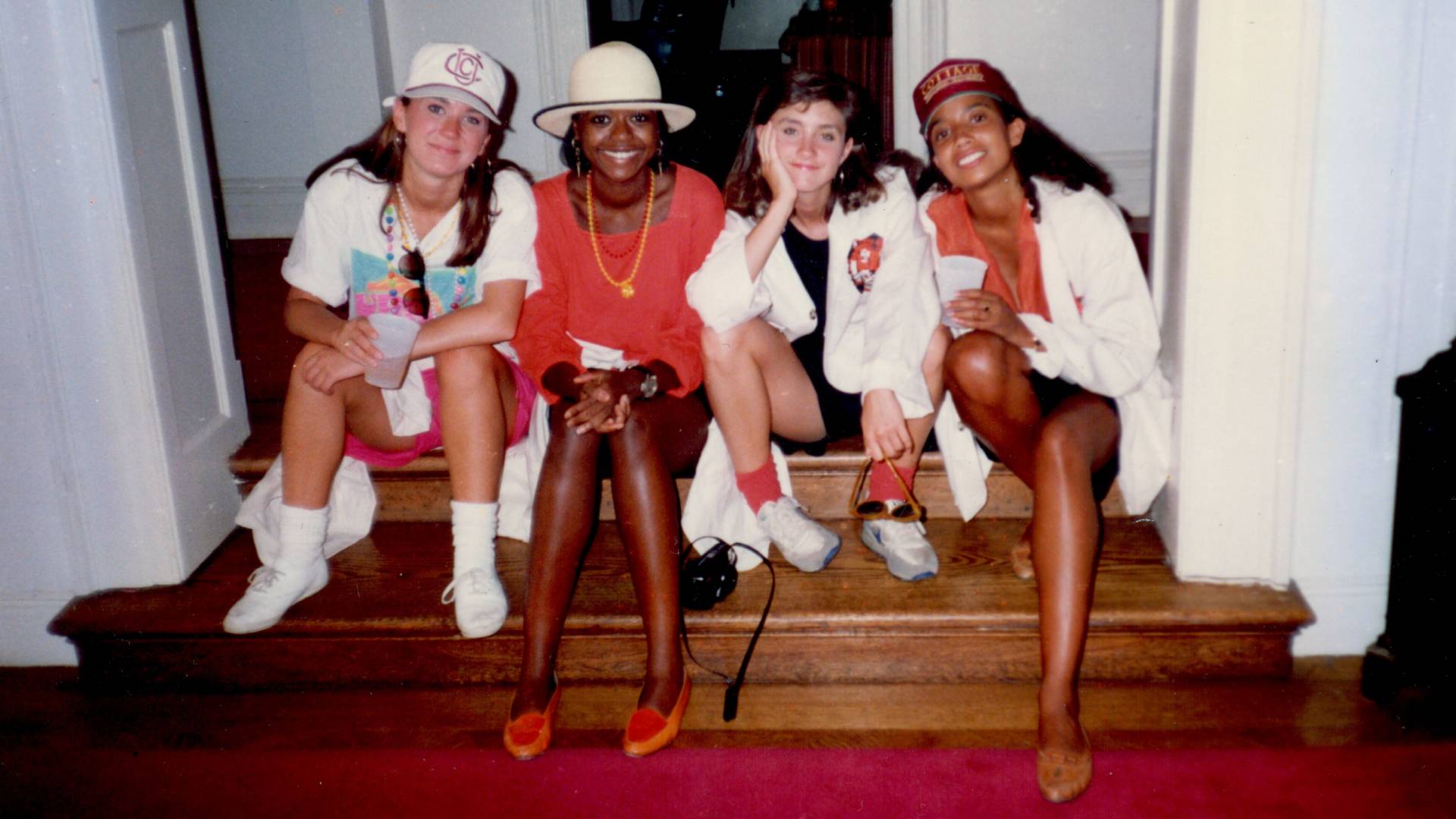 Mellody Hobson sits with friends at Reunions
