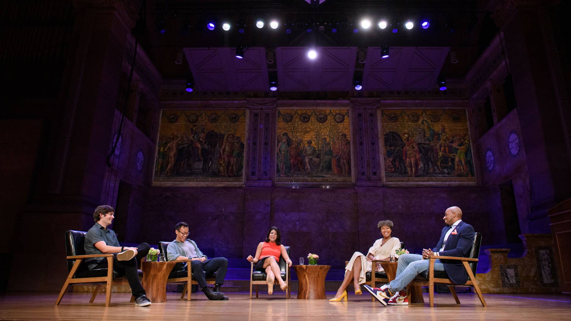 Gonzales speaks on a stage