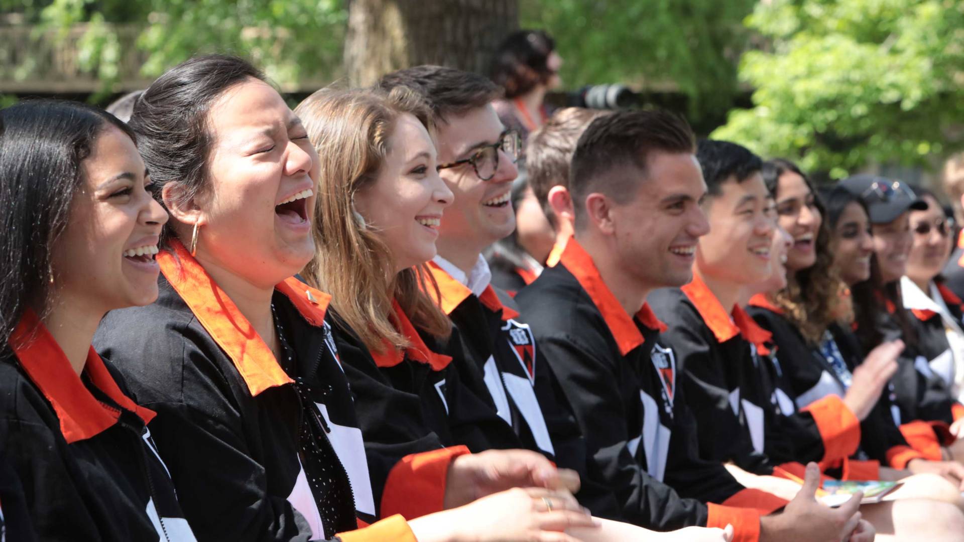 Student audience laugh at speeches