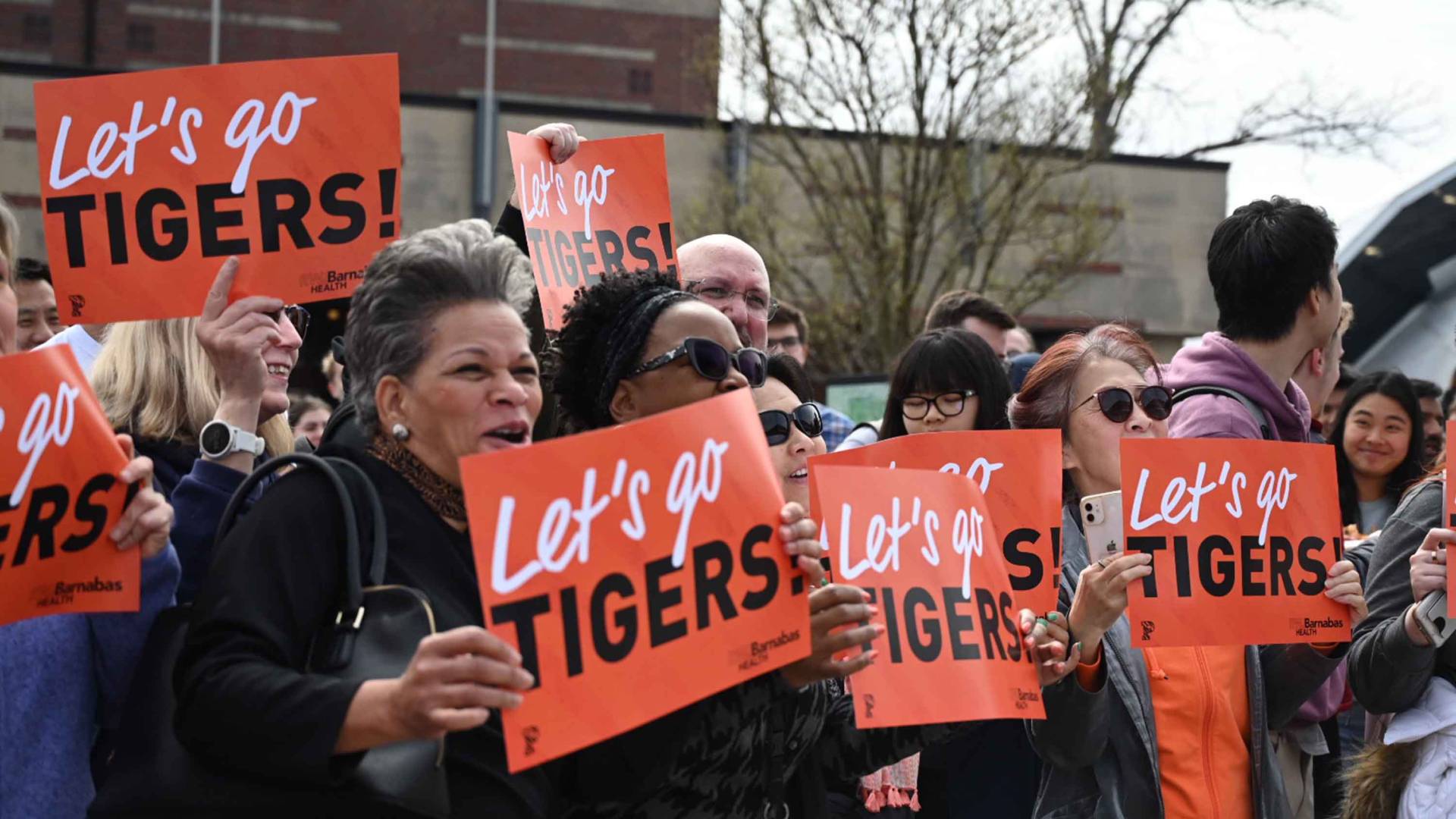 People cheering the Princeton basketball team