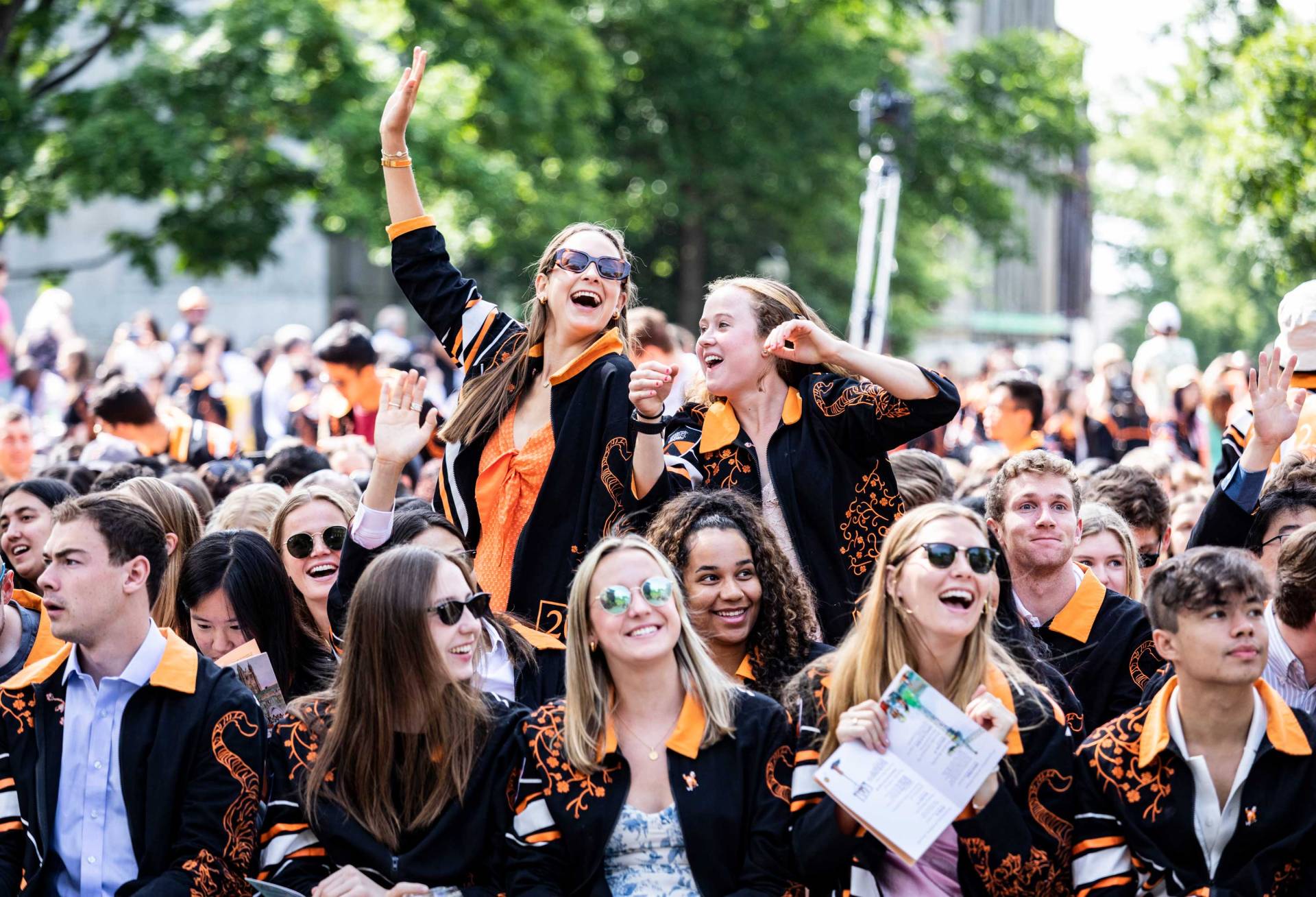 Students express joy while being seated