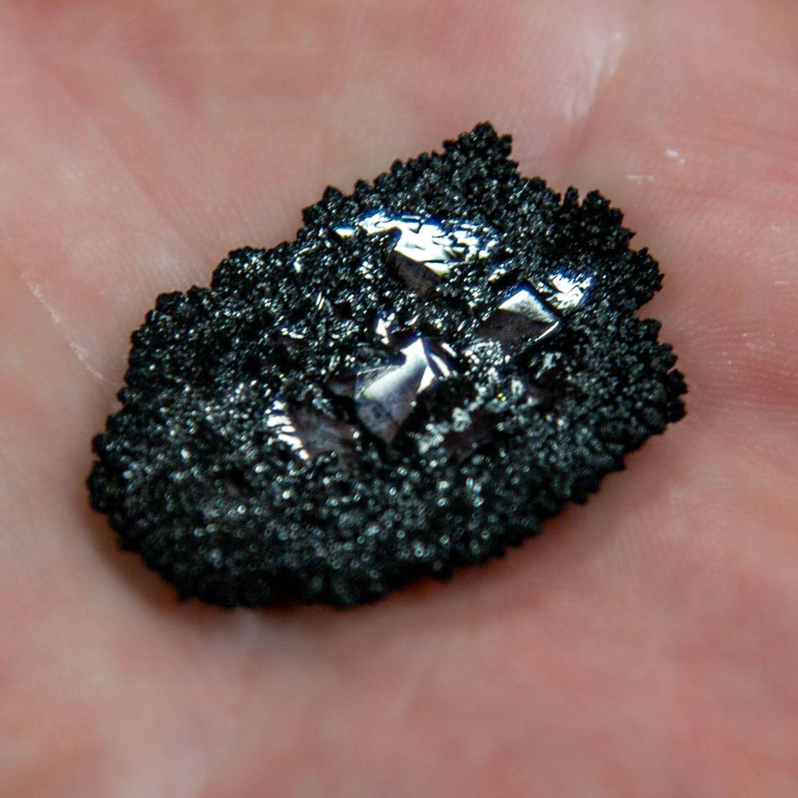 Person holding a diamond