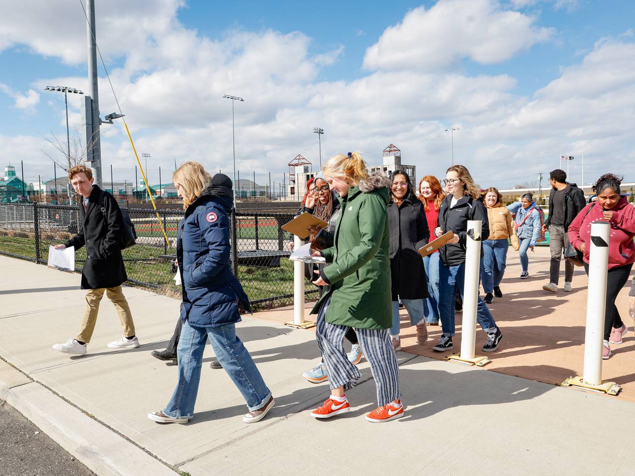 Group of Princeton students and members of the community walking