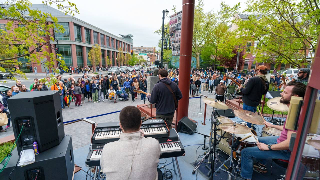 View from the stage looking at the crowd in the middle of the town.