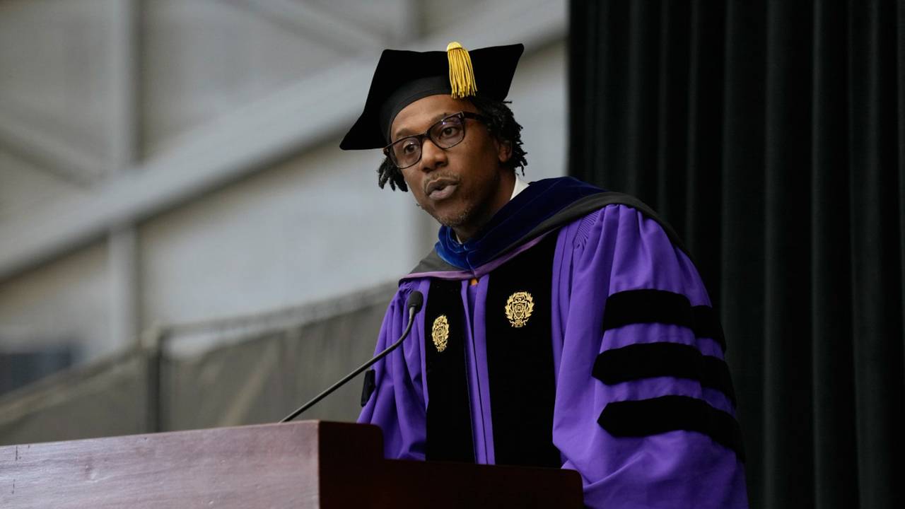 Dean Priestly at the podium