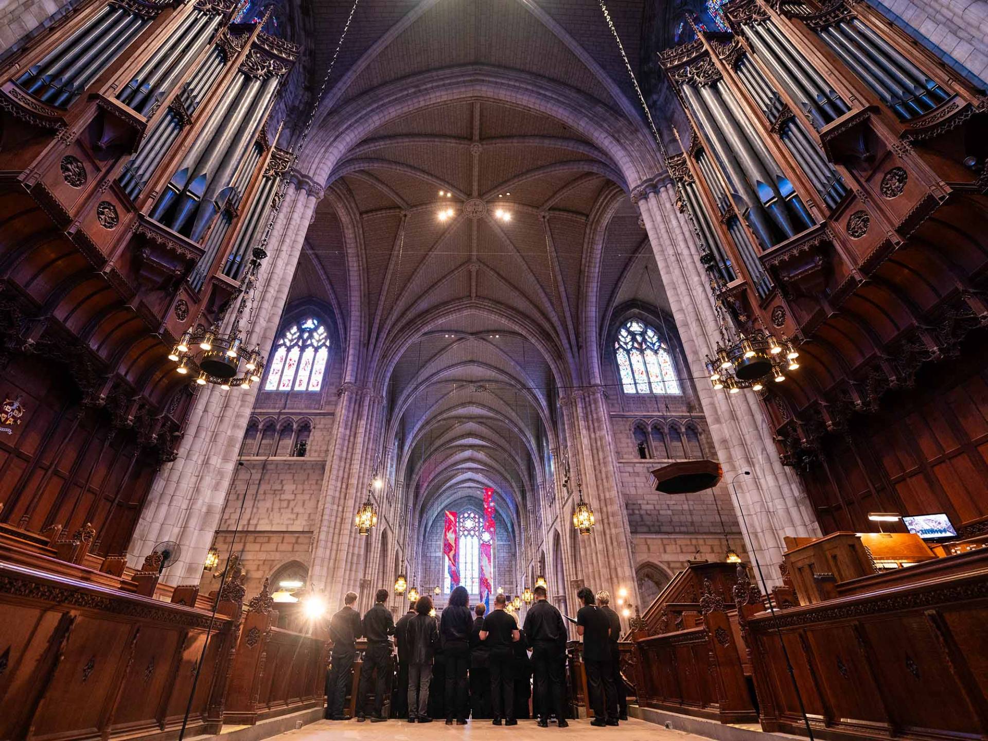 Group of people gathered inside the chapel
