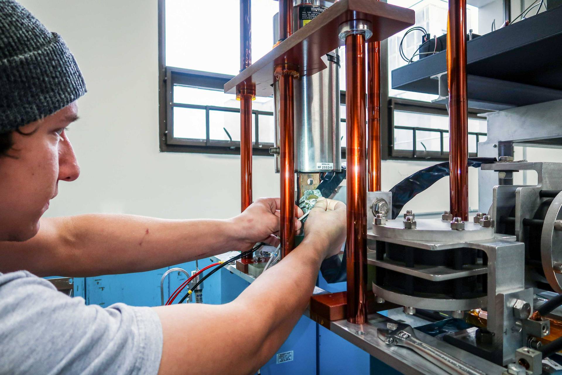 A man works on machinery