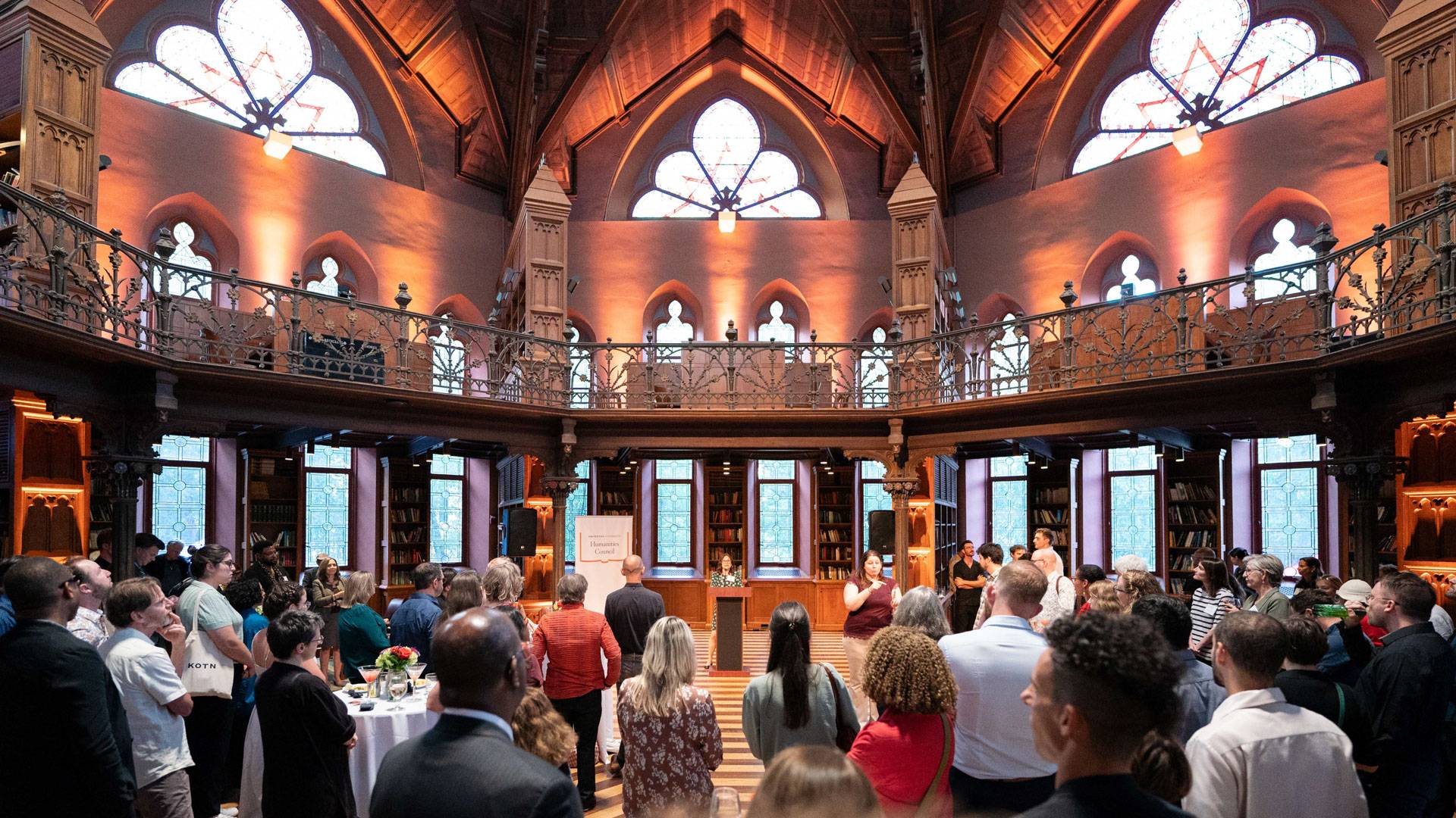 Professor Esther Schor speaks to a packed room