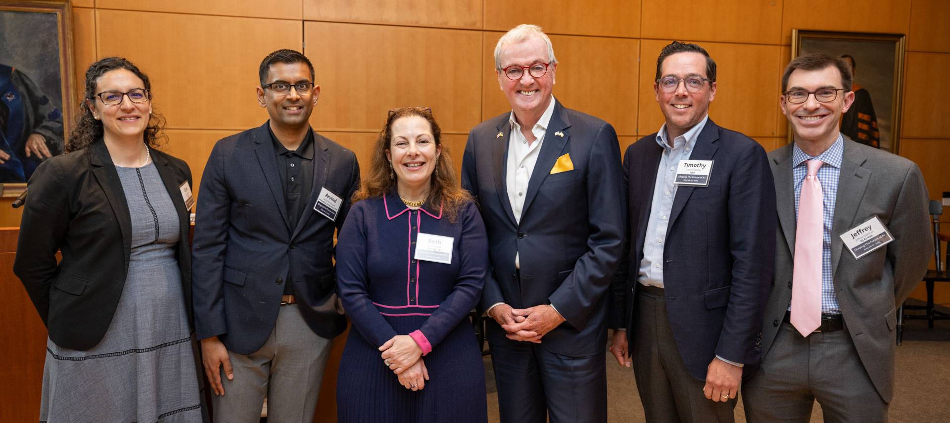 Attendees pose with Governor Murphy