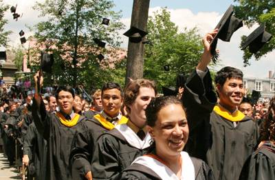 Seniors toss their hats