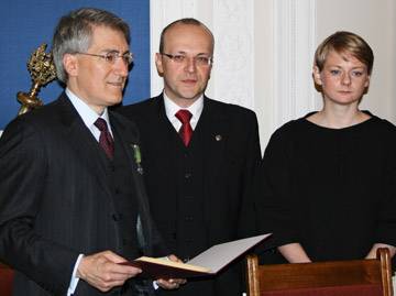 Robert George accepting medal