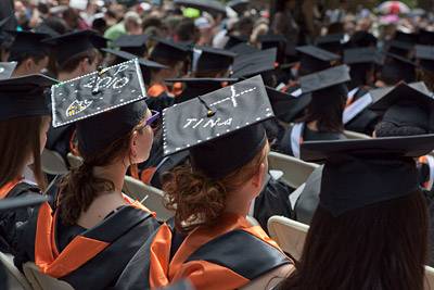 hats labeled with 2010 and Tina