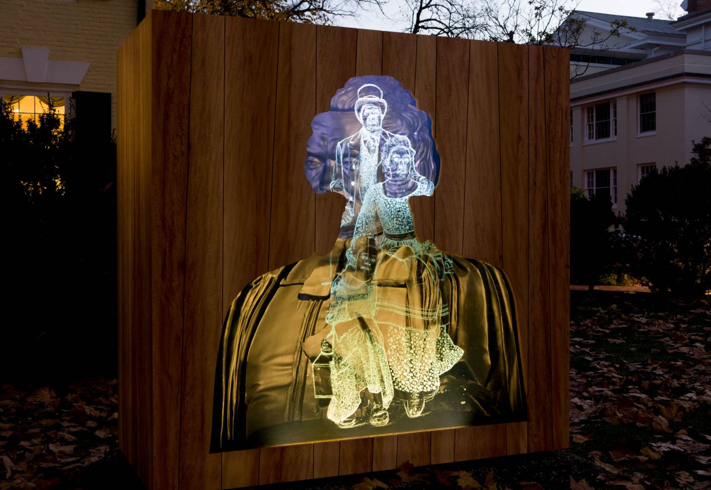 Titus Kaphar's sculpture lit up at night