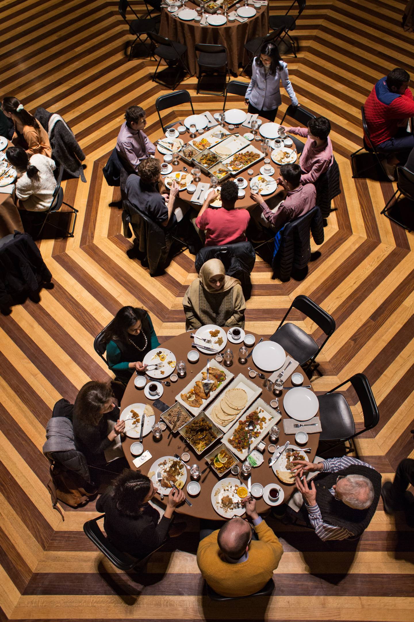 Students sit at tables during Medieval Cairo banquet