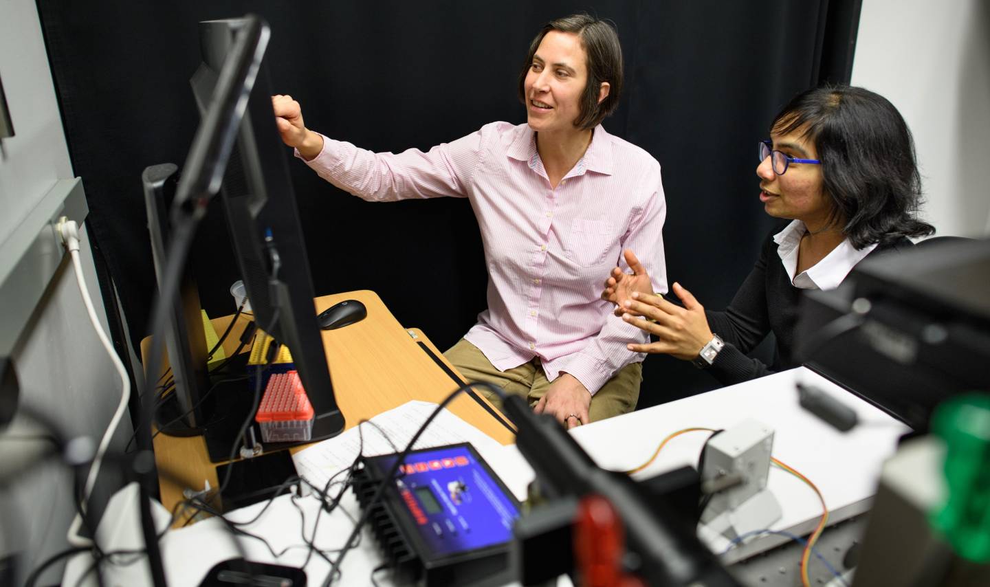 Sabine Petry in lab with student