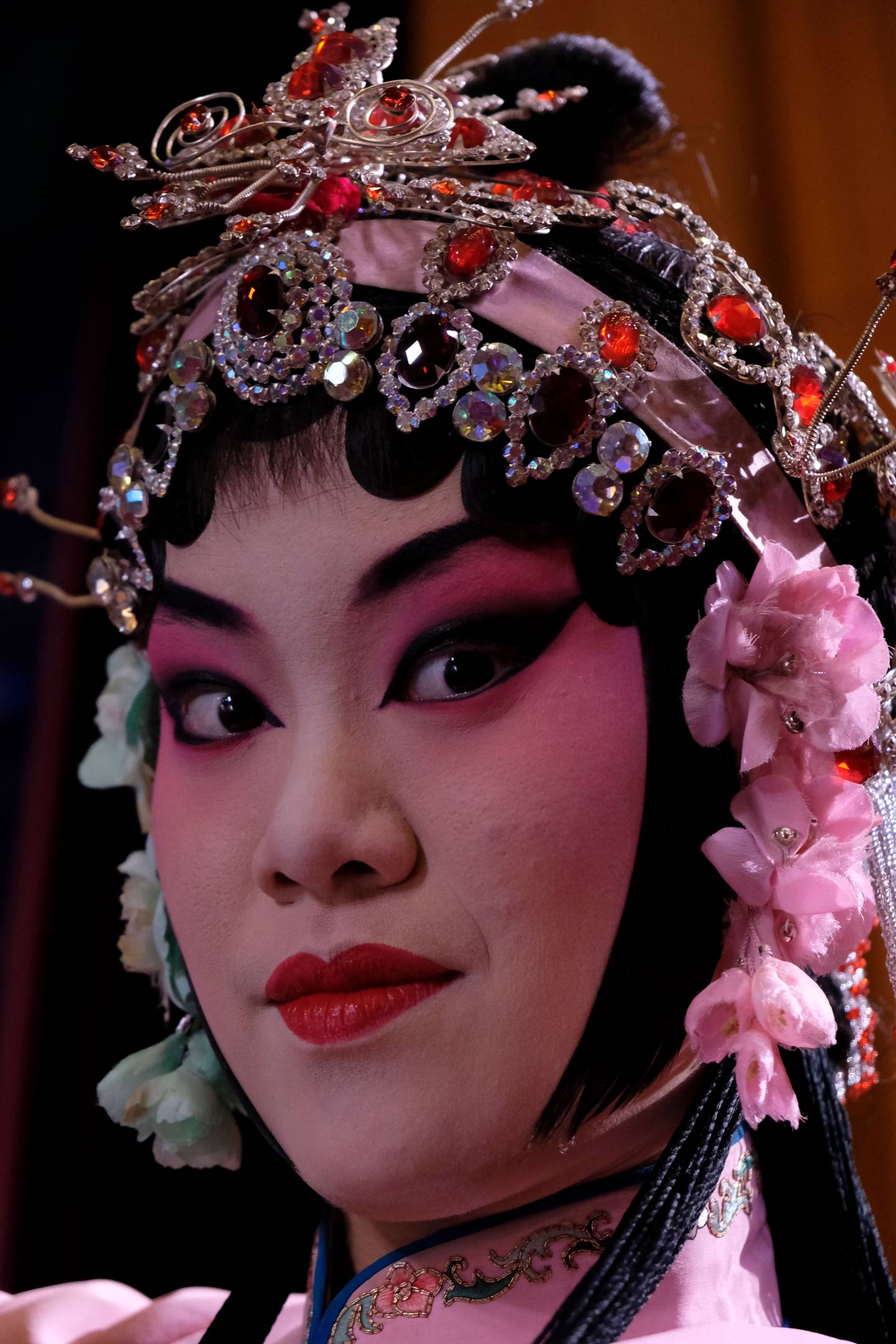 Closeup of students face in full makeup and headdress