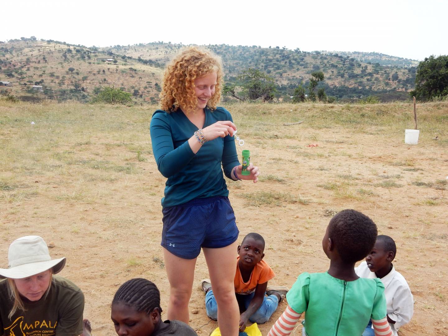 Maria Stahl outside with children