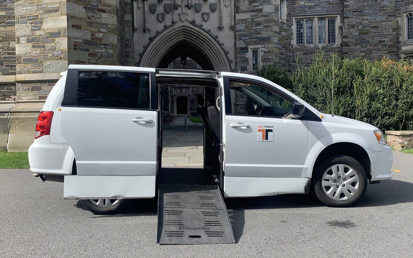Accessible Tiger Transit van with ramp deployed