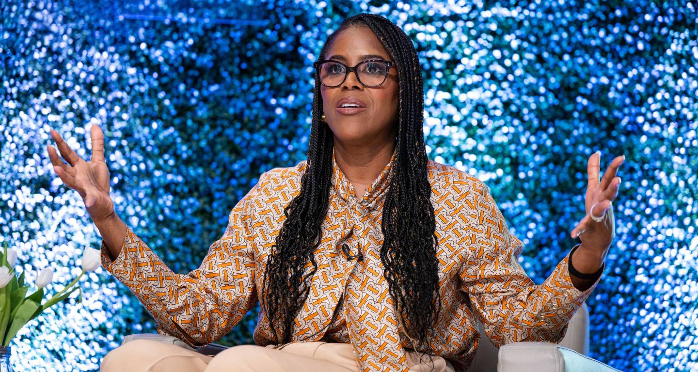 Thasunda Brown Duckett gesticulates during her talk