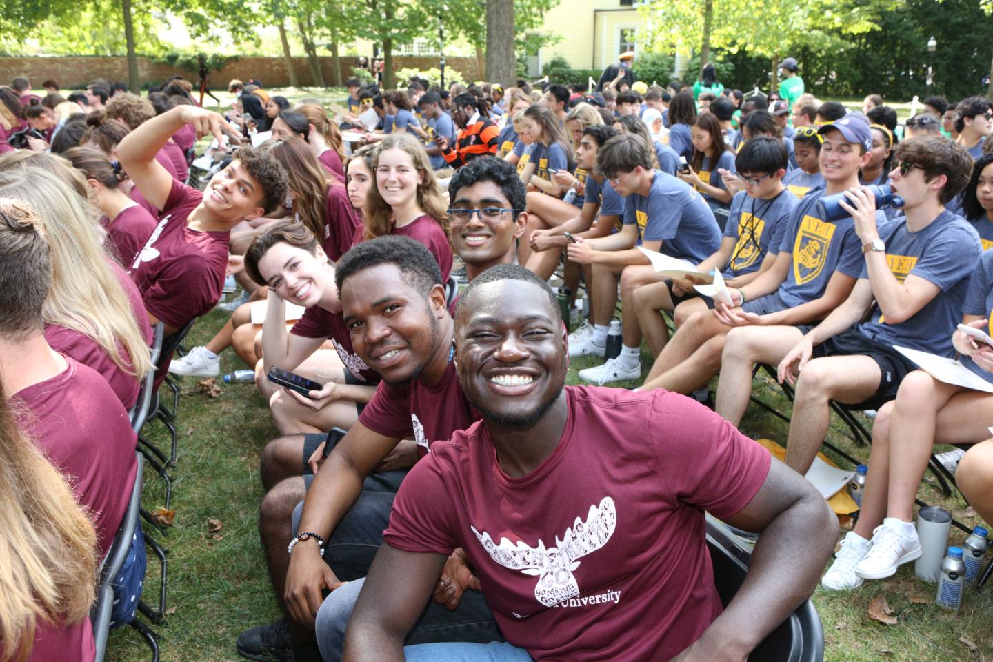 students wait for Opening Exercises to begin