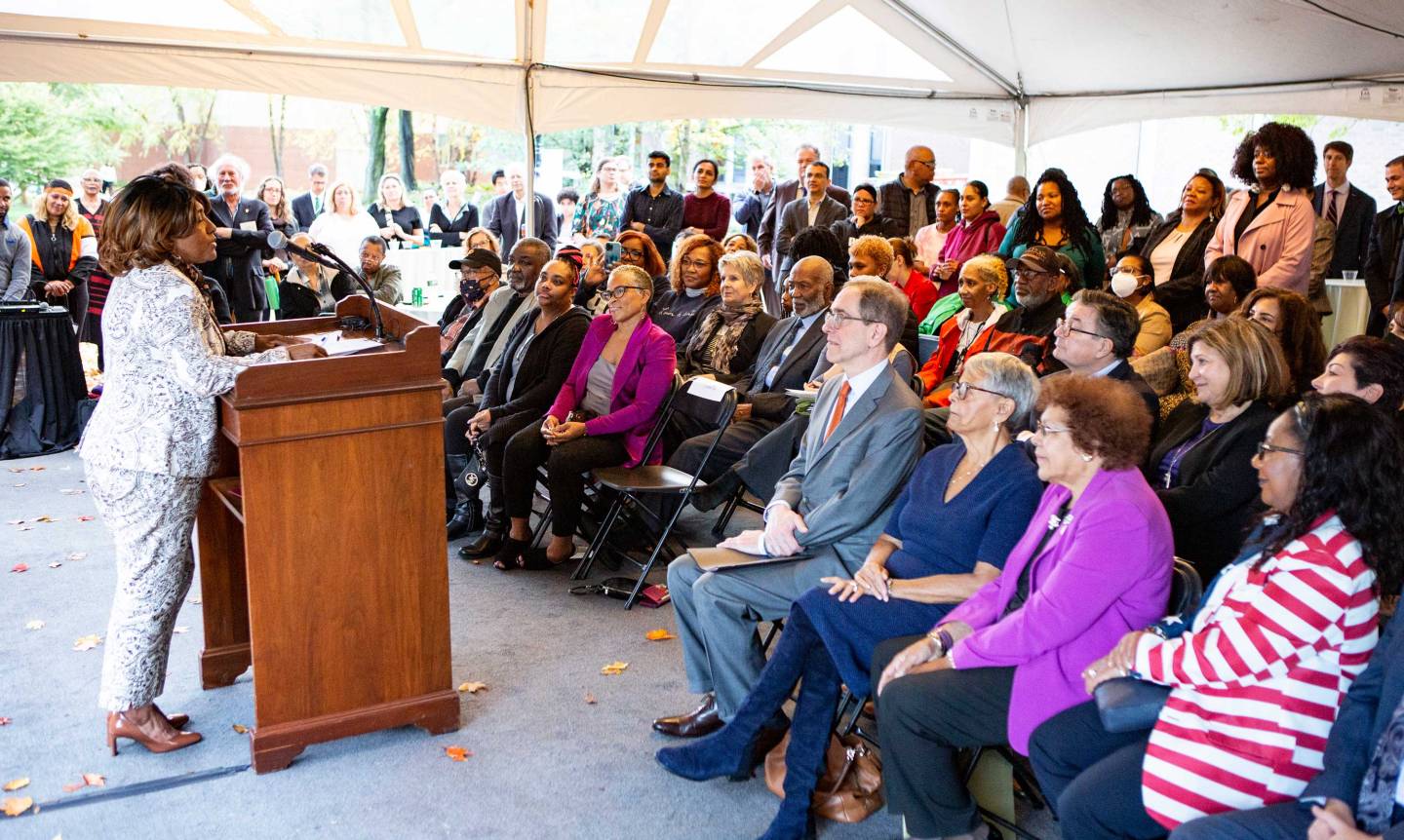 Laura Wooten's daughter makes a speech to the crowd during the dedication event
