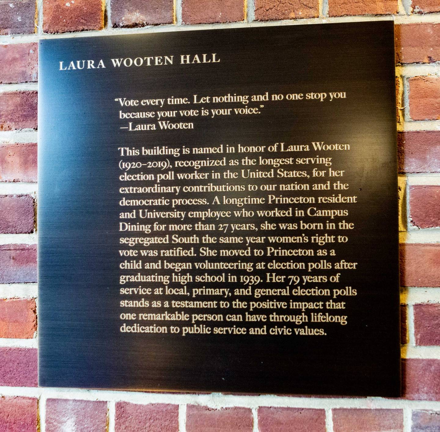 Plaque honoring Laura Wooten and her accomplishments as longest serving poll worker in the USA